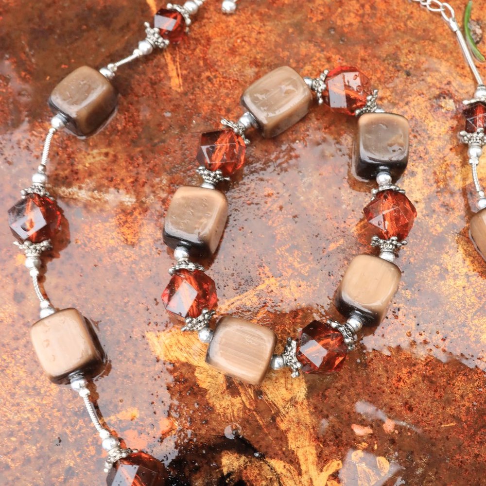 Bronze cats eys bead Necklace and bracelet set with silver spacers.